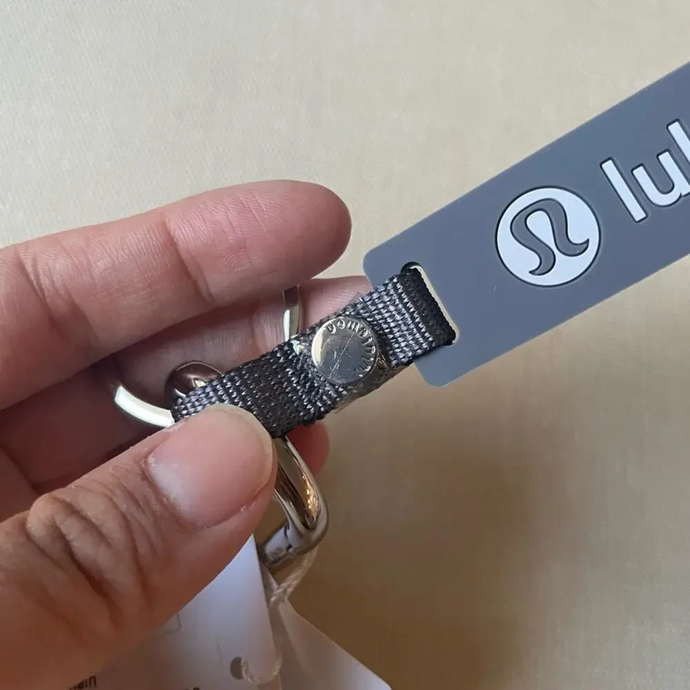 Lululemon silicone keychain - Solar Grey/Starch Blue